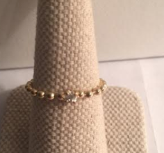 Gold ring with mini diamond